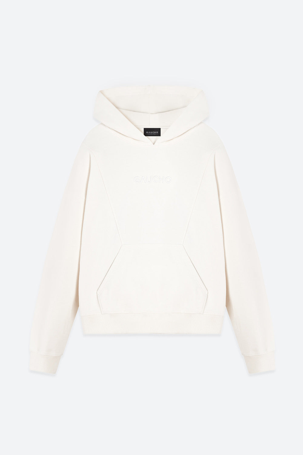 White hoodie on a light beige background