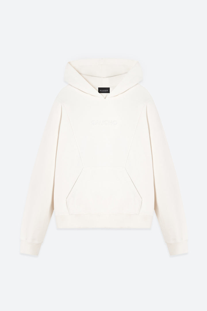White hoodie on a light beige background