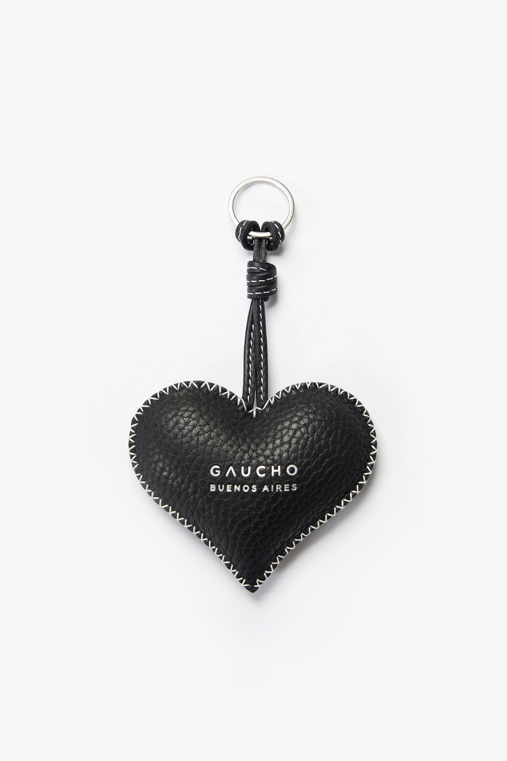 Black heart-shaped keychain with 'Gaucho Buenos Aires' branding on a white background