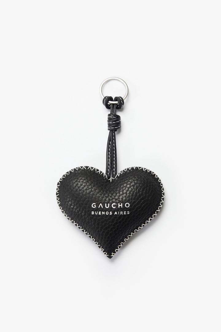 Black heart-shaped keychain with 'Gaucho Buenos Aires' branding on a white background