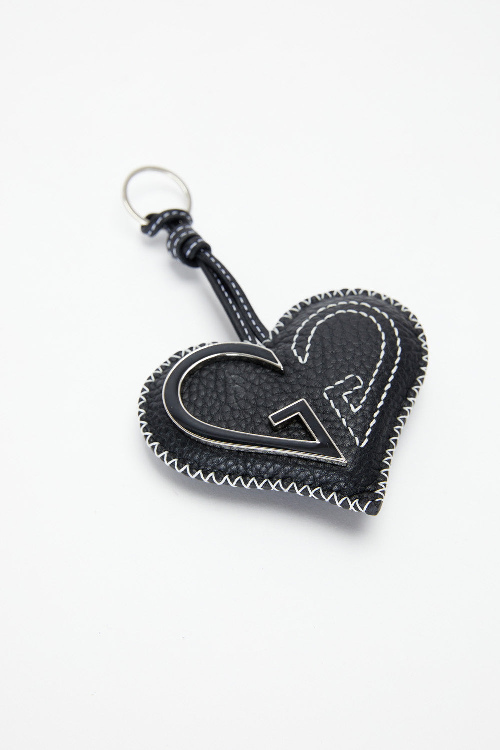Heart-shaped keychain with a logo on a white background