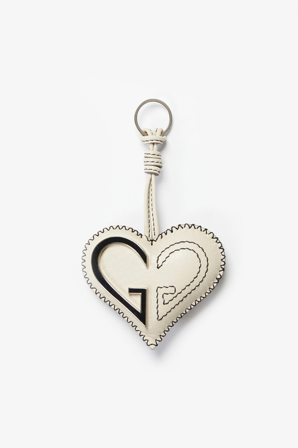 Heart-shaped keychain with a unique design on a white background
