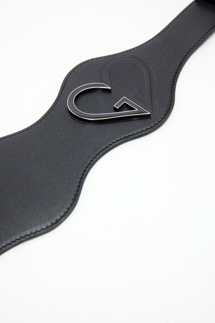 Black leather belt with a silver logo on a white background