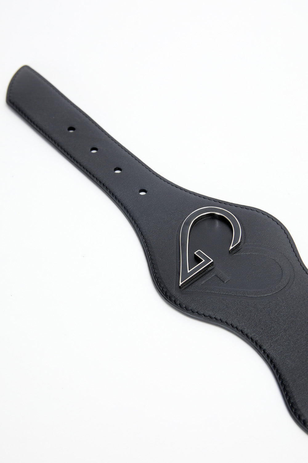 Black leather paddle with a logo on a white background