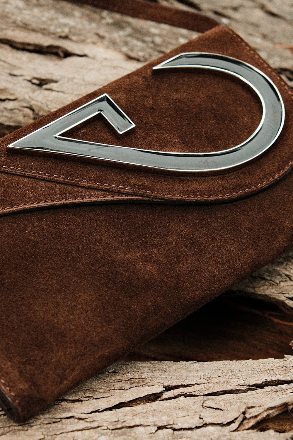 Brown purse with a unique design 