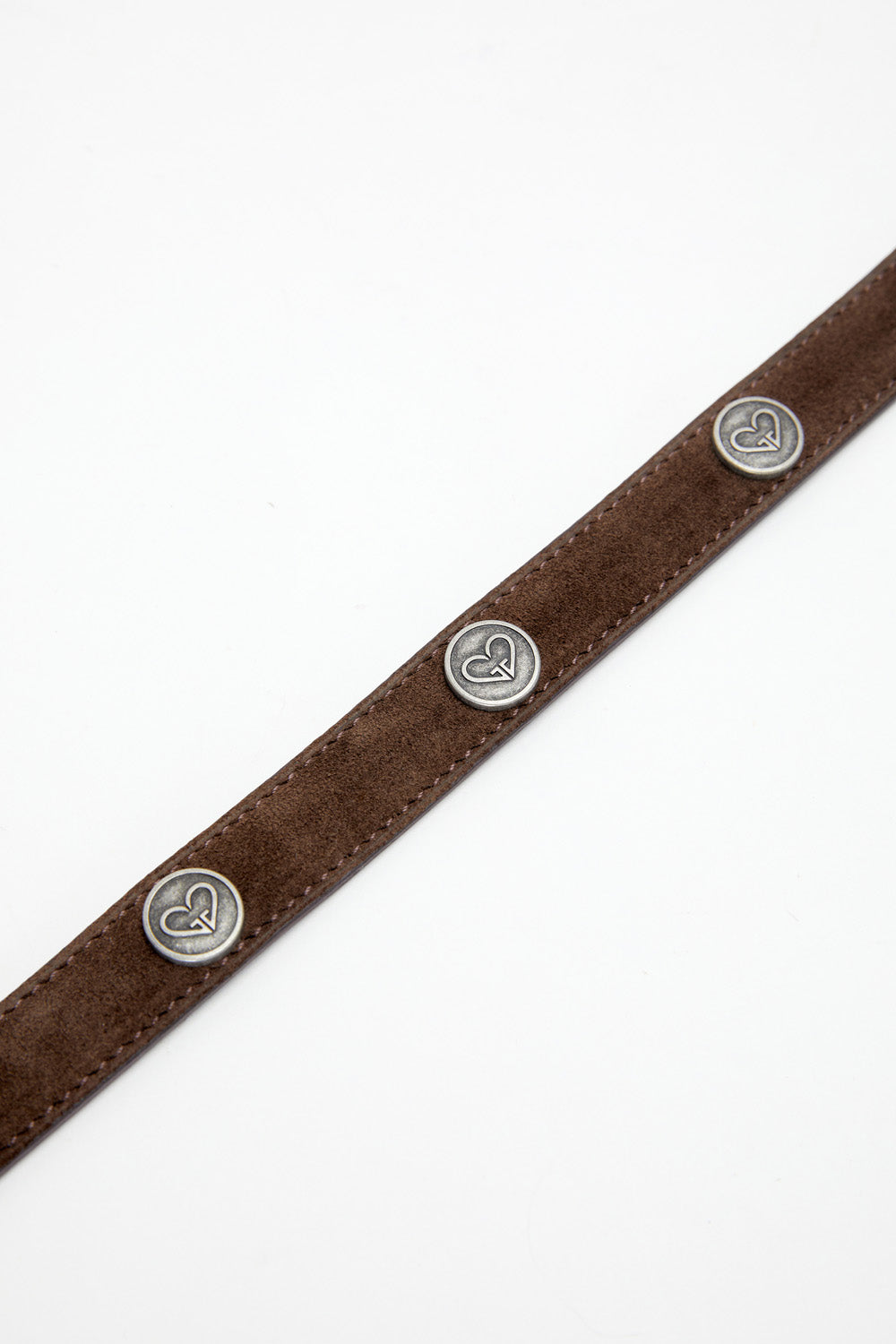 Brown leather belt with silver buttons on a white background