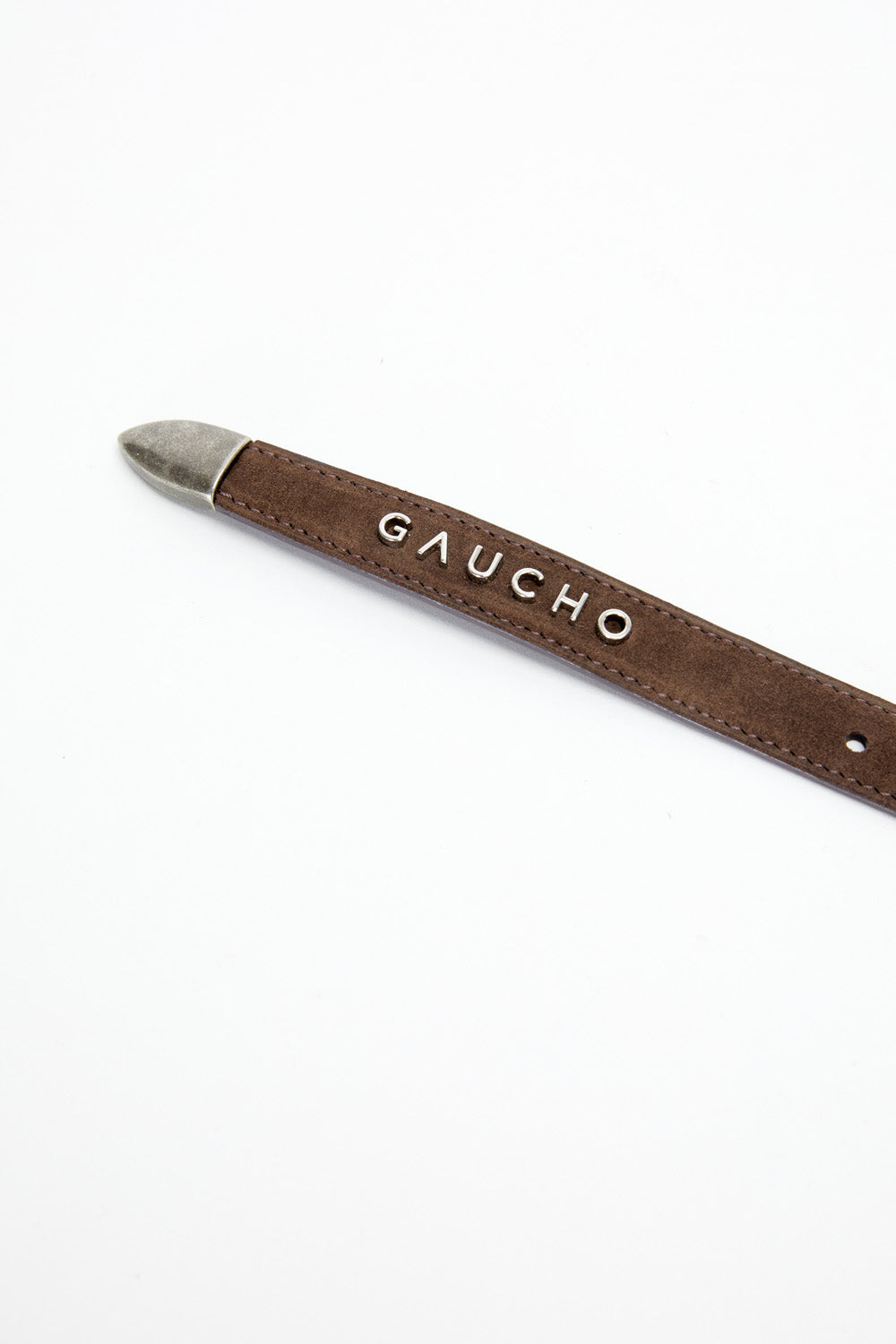 Brown leather belt with 'Gaucho' branding on a white background