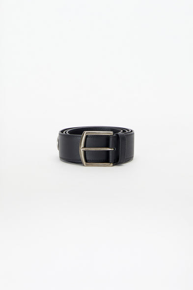 Black belt with a silver buckle on a white background