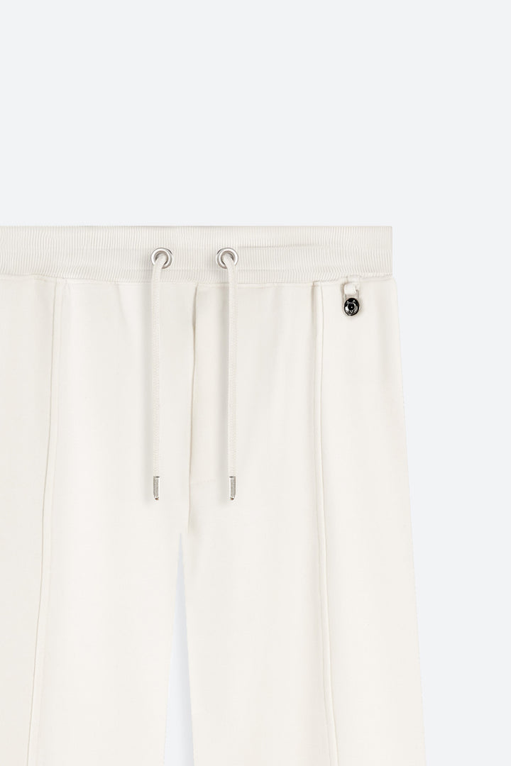 White pants with drawstrings on a white background