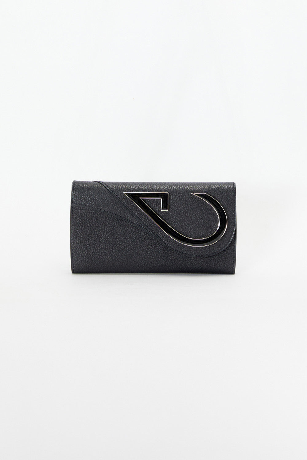 Black clutch bag with a unique design on a white background