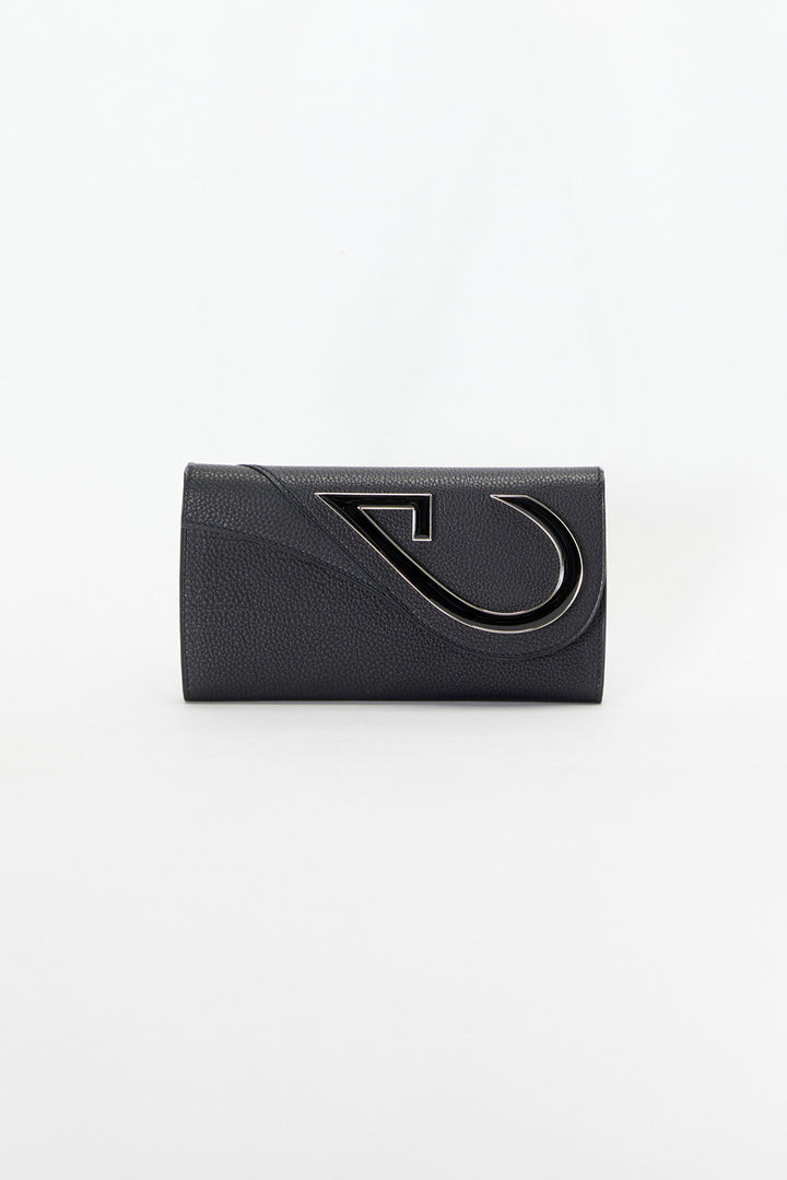 Black clutch bag with a unique design on a white background