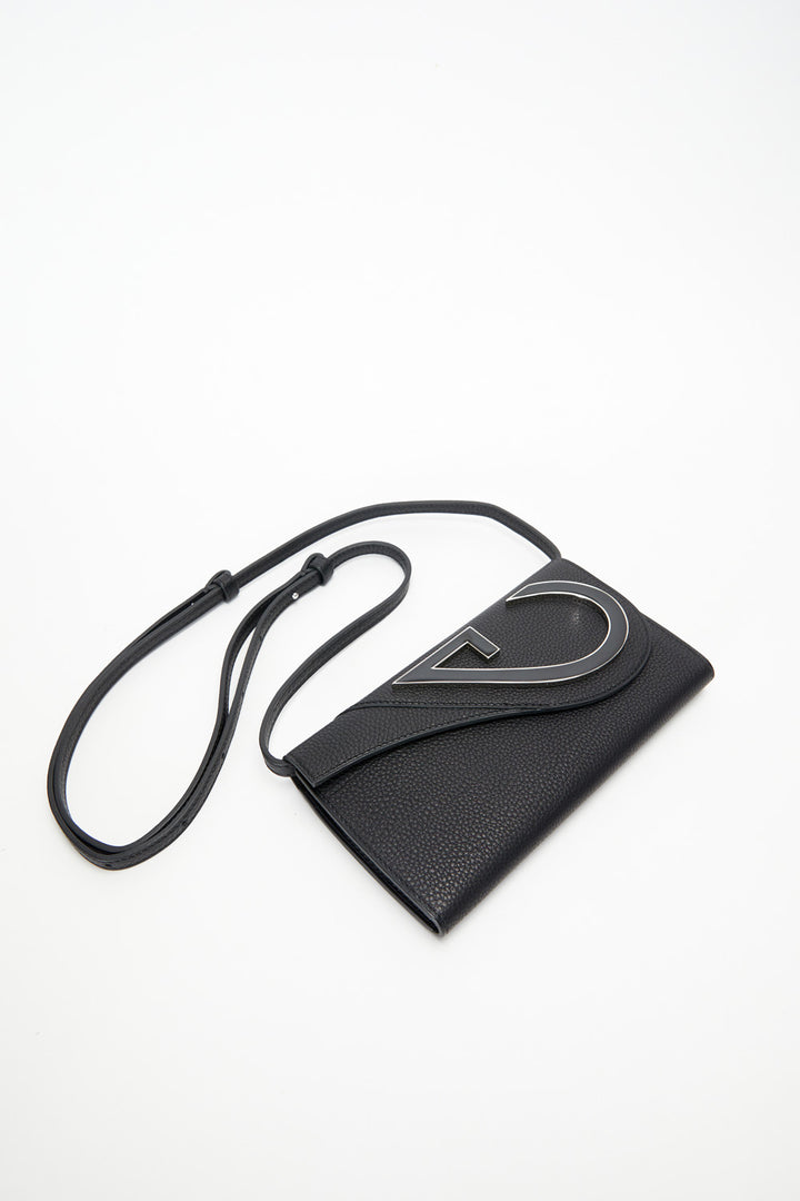 Black leather pouch with a strap on a white background