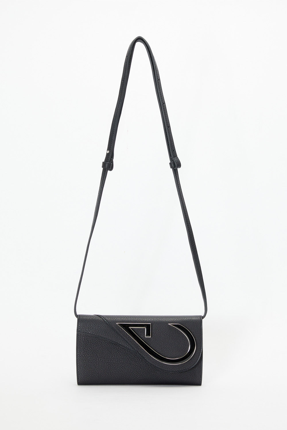 Black handbag with a unique design on a white background