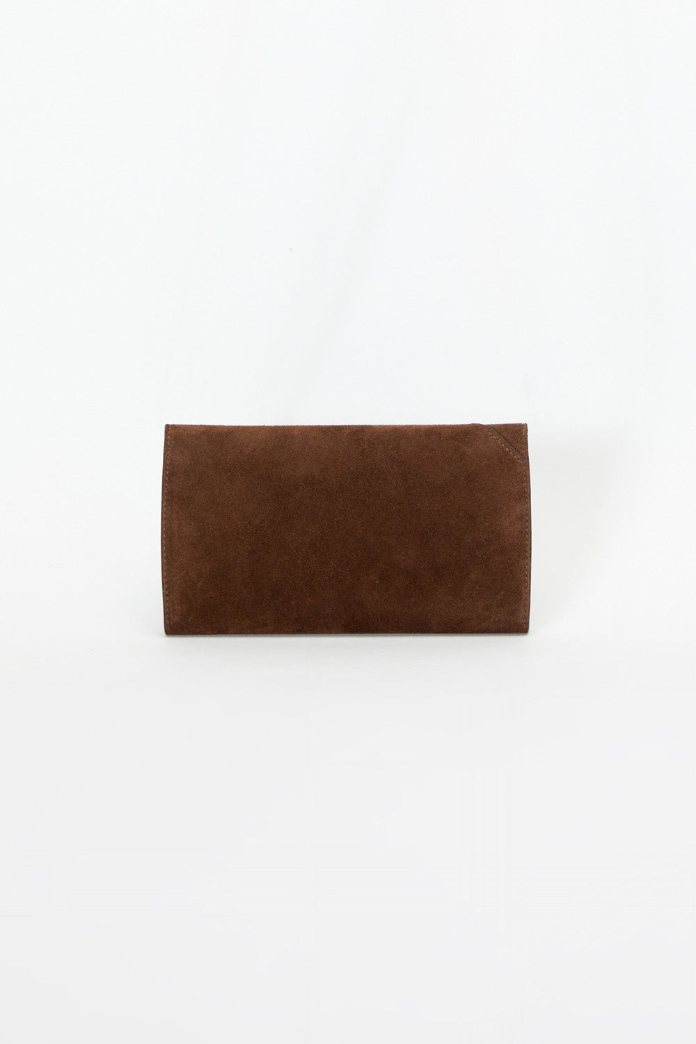 Brown suede clutch on a white background