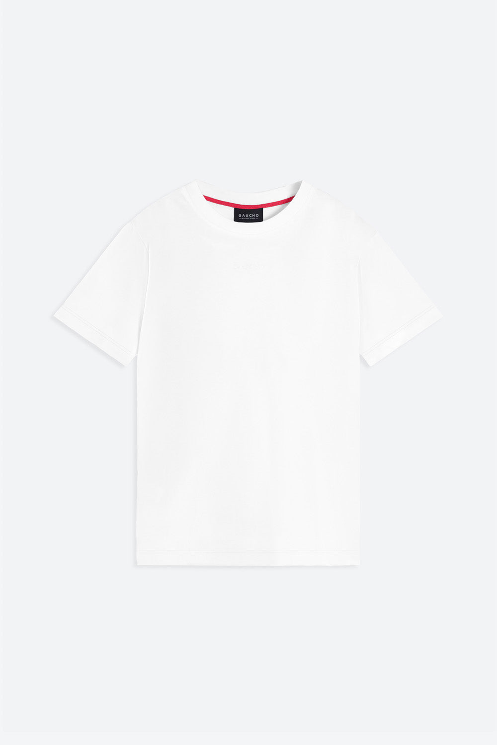 White t-shirt with a small black tag on a white background