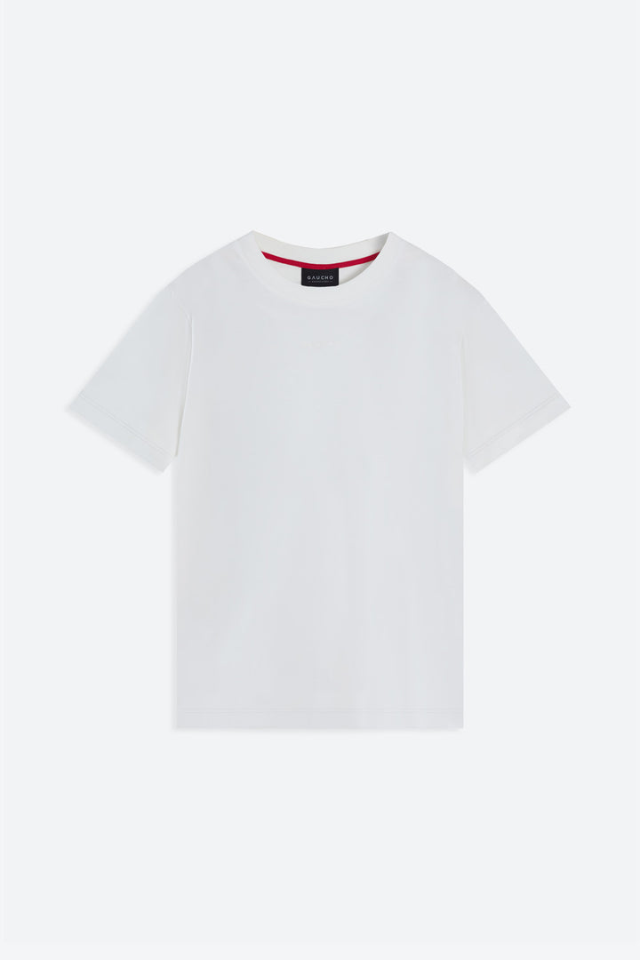 White t-shirt with a small brand logo on a light gray background