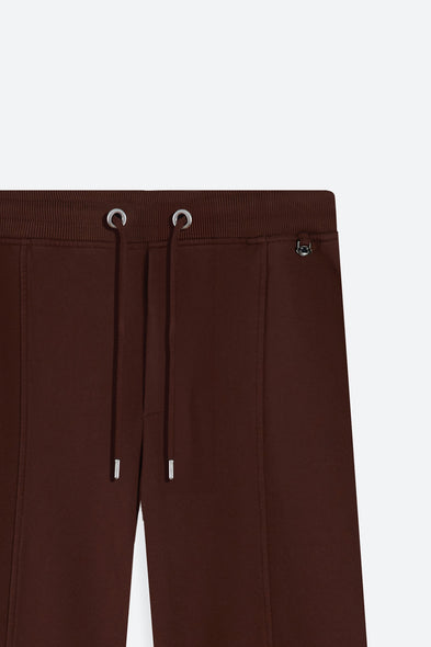 Brown sweatpants with drawstring on a white background