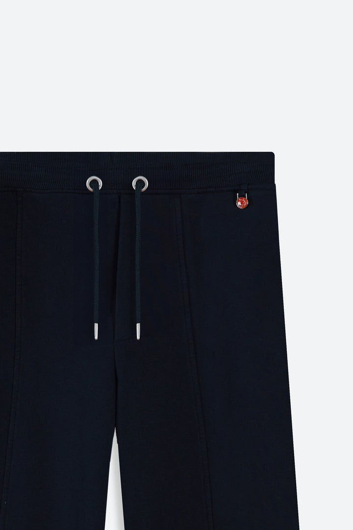 Black pants with drawstring and brand logo on a white background