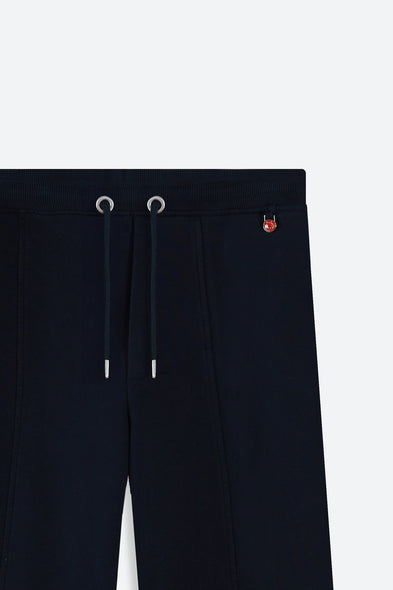 Black pants with drawstring and brand logo on a white background