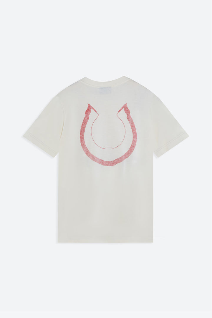 White t-shirt with pink horseshoe design on a white background
