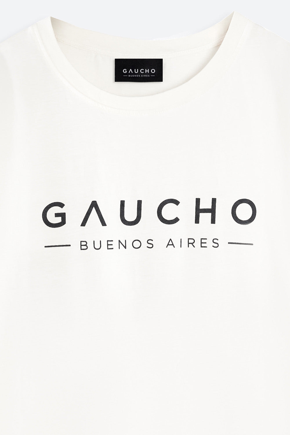 White t-shirt with 'Gaucho Buenos Aires' logo on a white background
