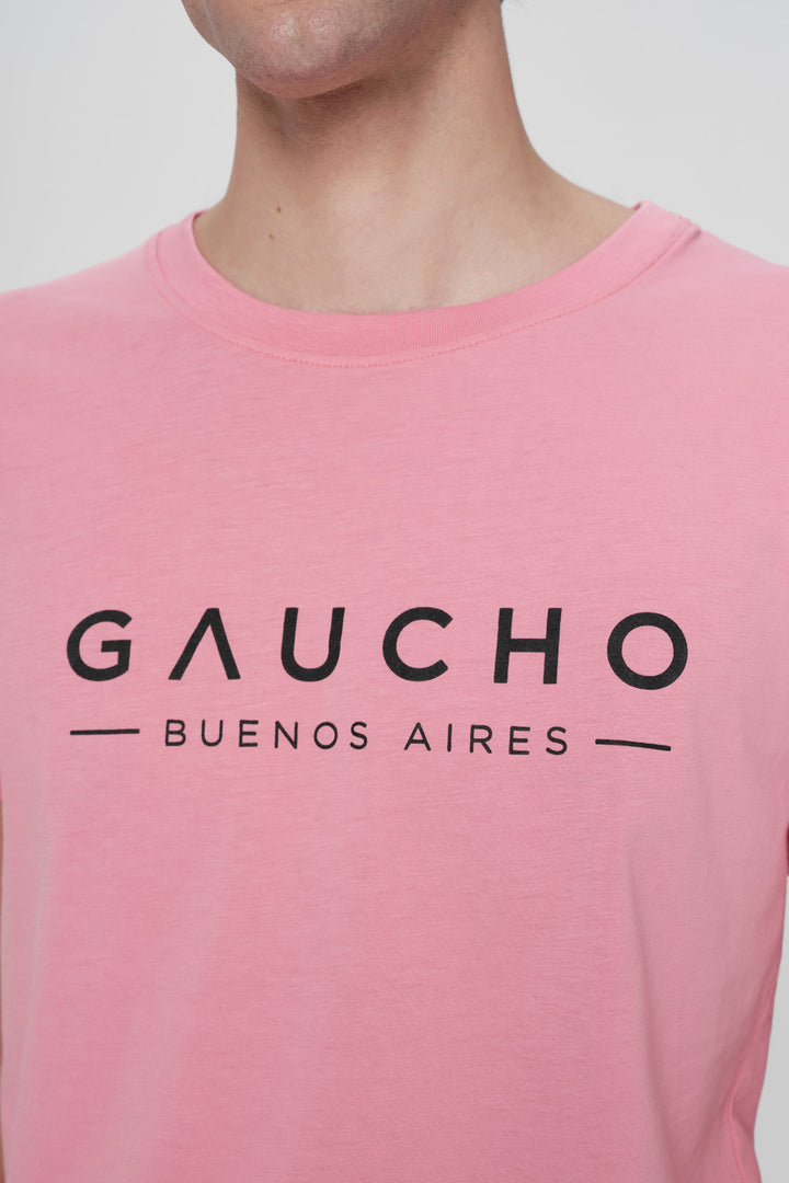 Pink t-shirt with 'Gaucho Buenos Aires' text on a plain background