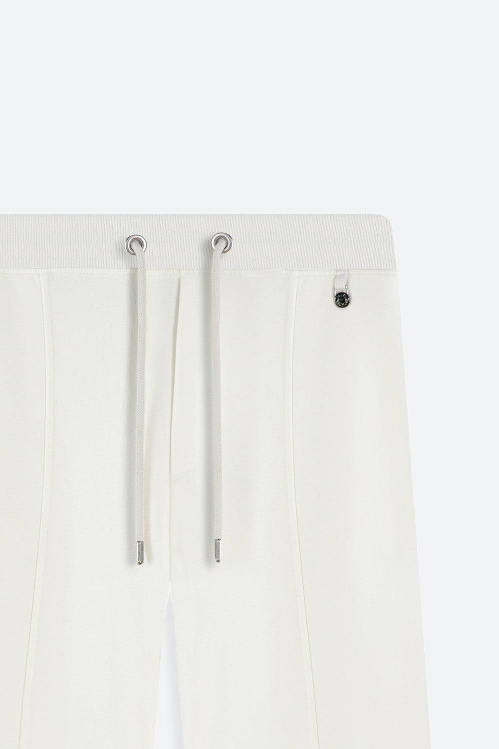 White pants with drawstrings on a white background