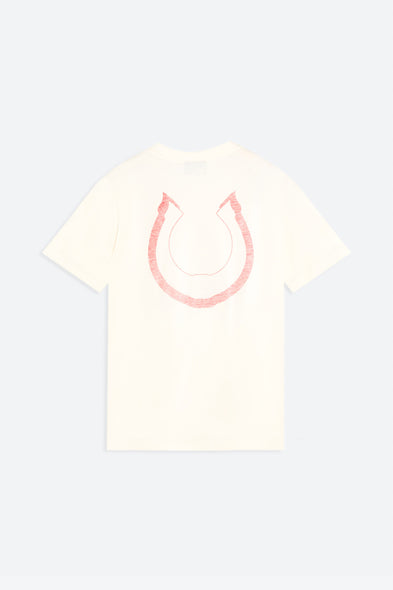 White t-shirt with pink horseshoe design on a light gray background