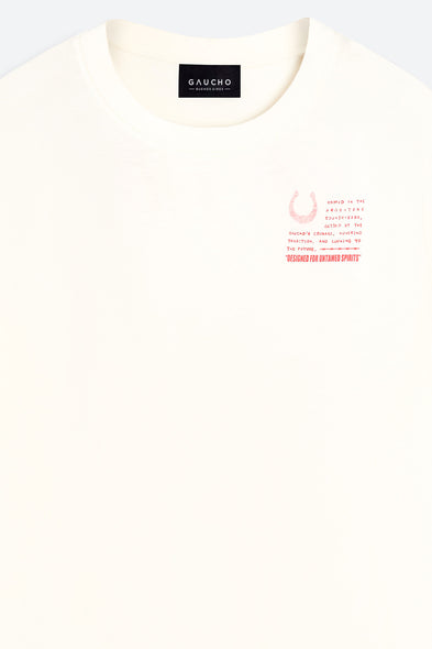 White t-shirt with text and a logo on a light gray background