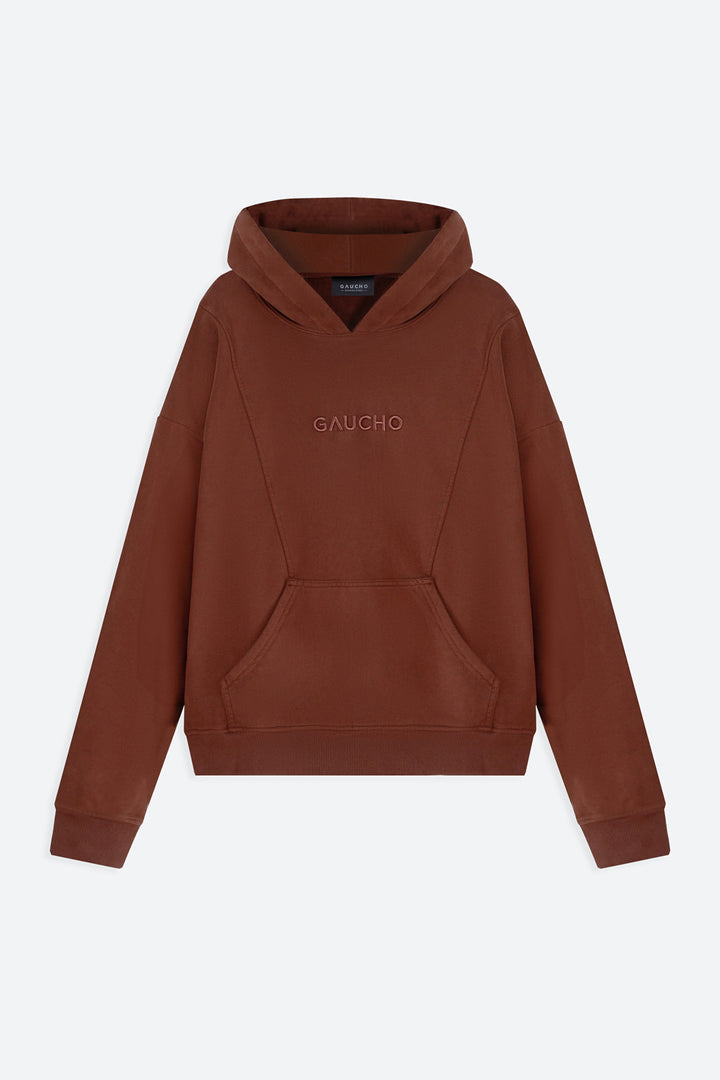 Brown hoodie with 'Gaucho' branding on a light gray background