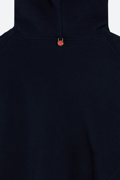 Black hoodie with a red button on a white background