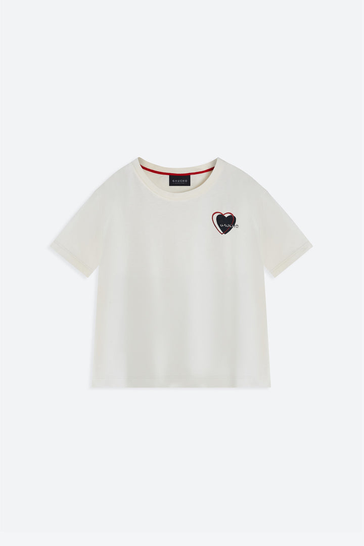 White t-shirt with a heart-shaped logo on a white background