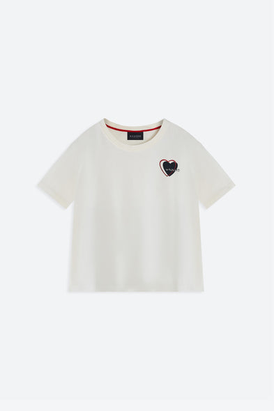 White t-shirt with a heart-shaped logo on a white background