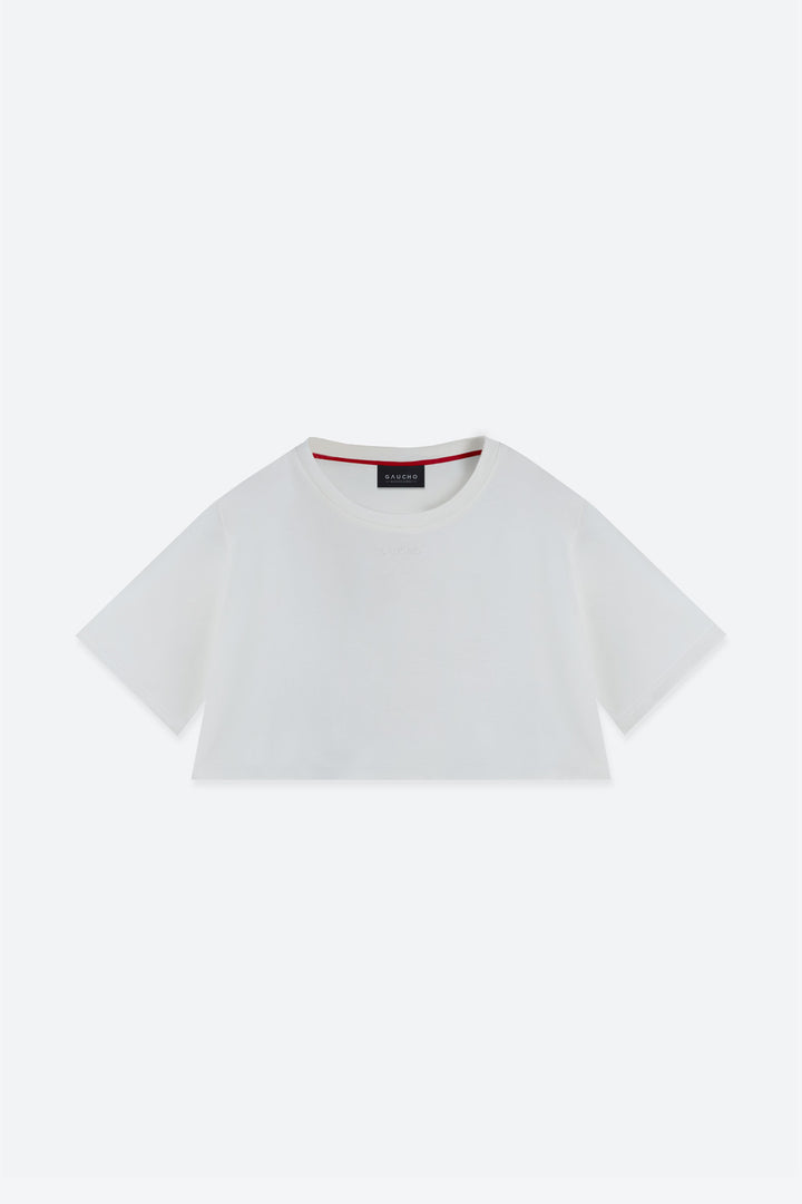 White t-shirt with a small logo on a white background