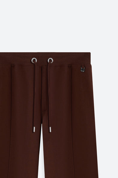 Brown pants with drawstring on a white background