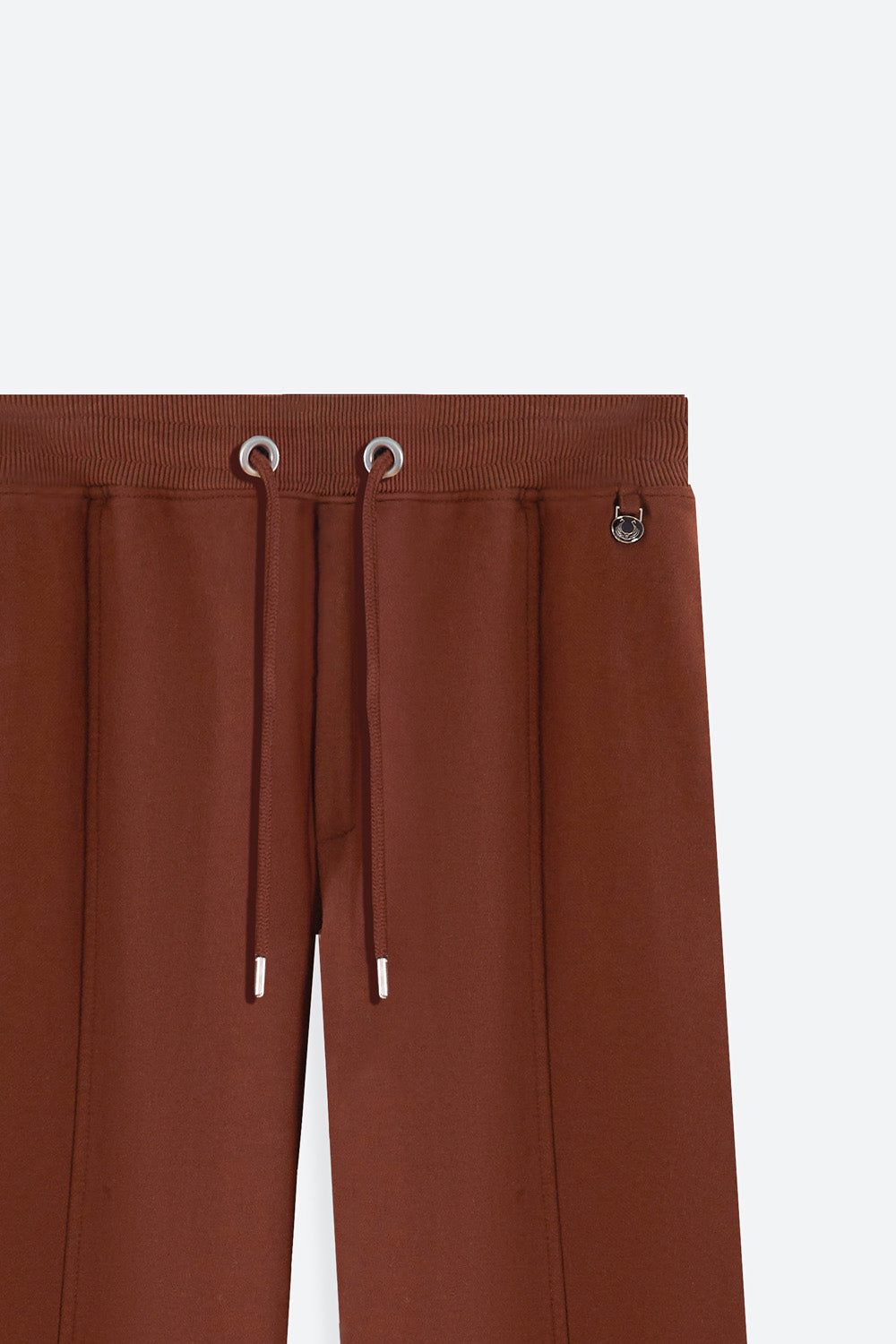 Brown pants with drawstring on a white background