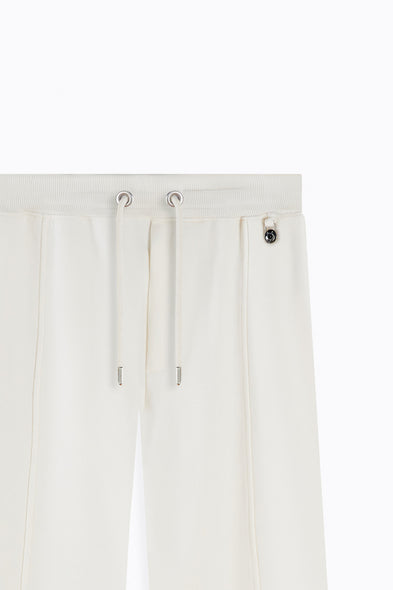 Close-up of a white pants with drawstring on a white background