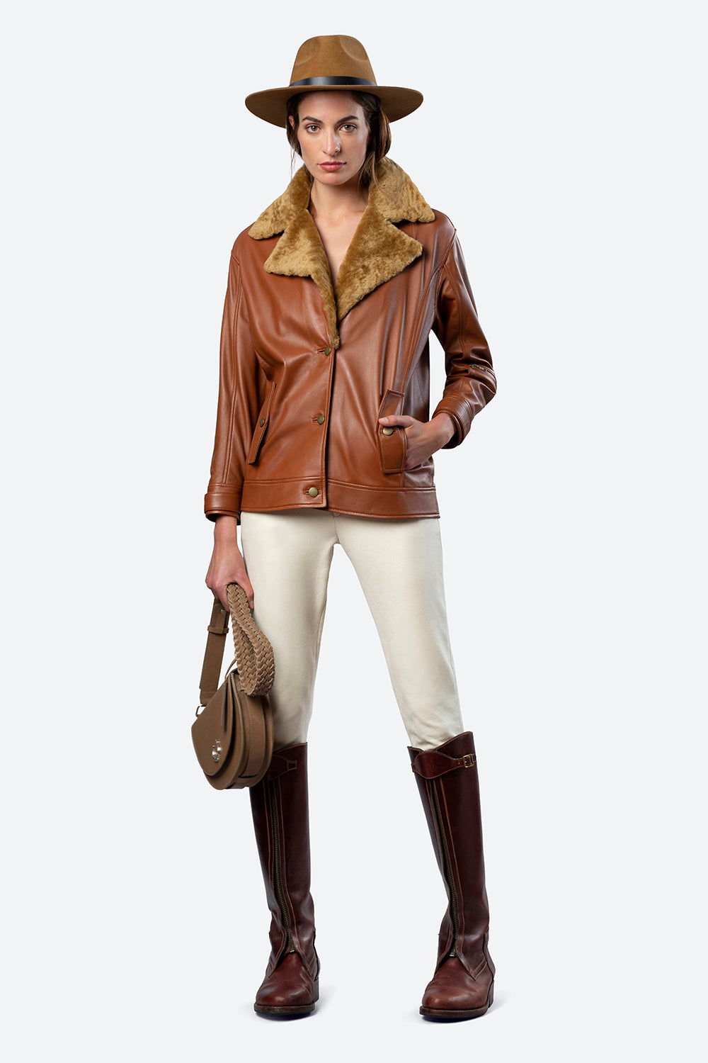 Woman models the Lavalle Shearling Collar Jacket in Cognac