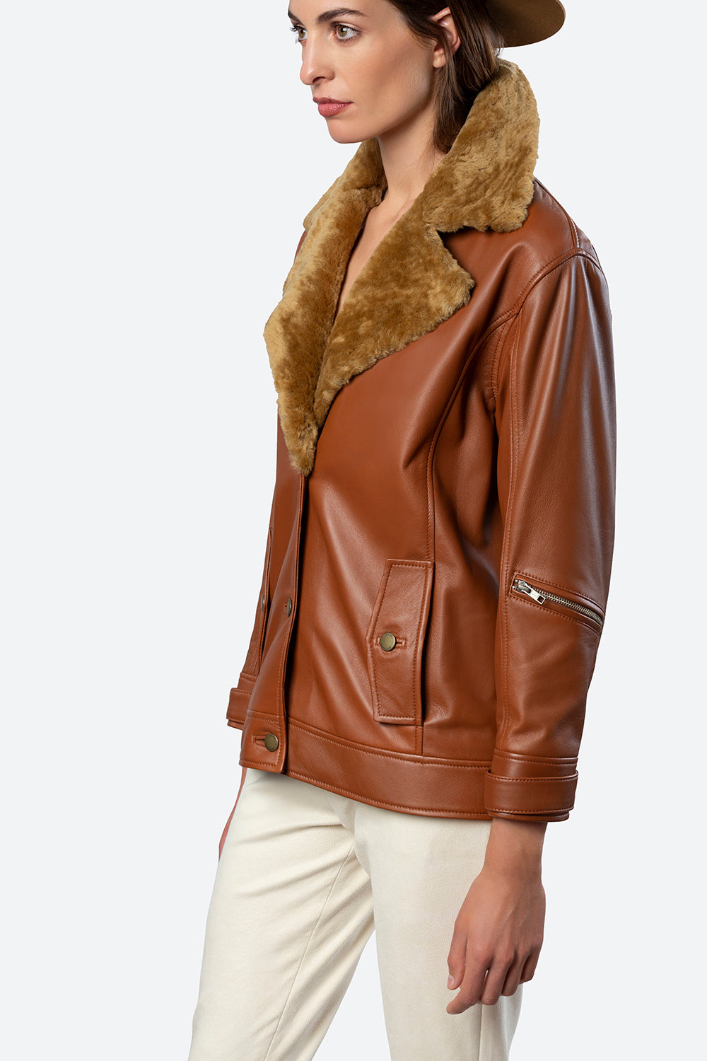 Woman models the Lavalle Shearling Collar Jacket in Cognac