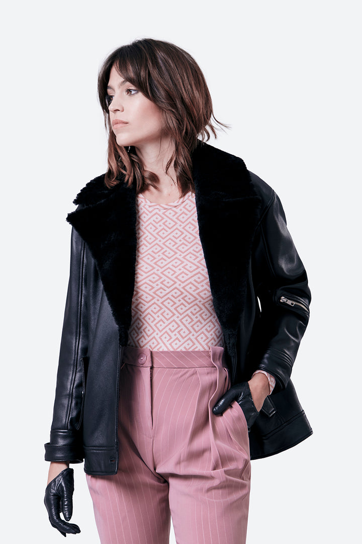 Woman models the Lavalle Shearling Collar Jacket in Black