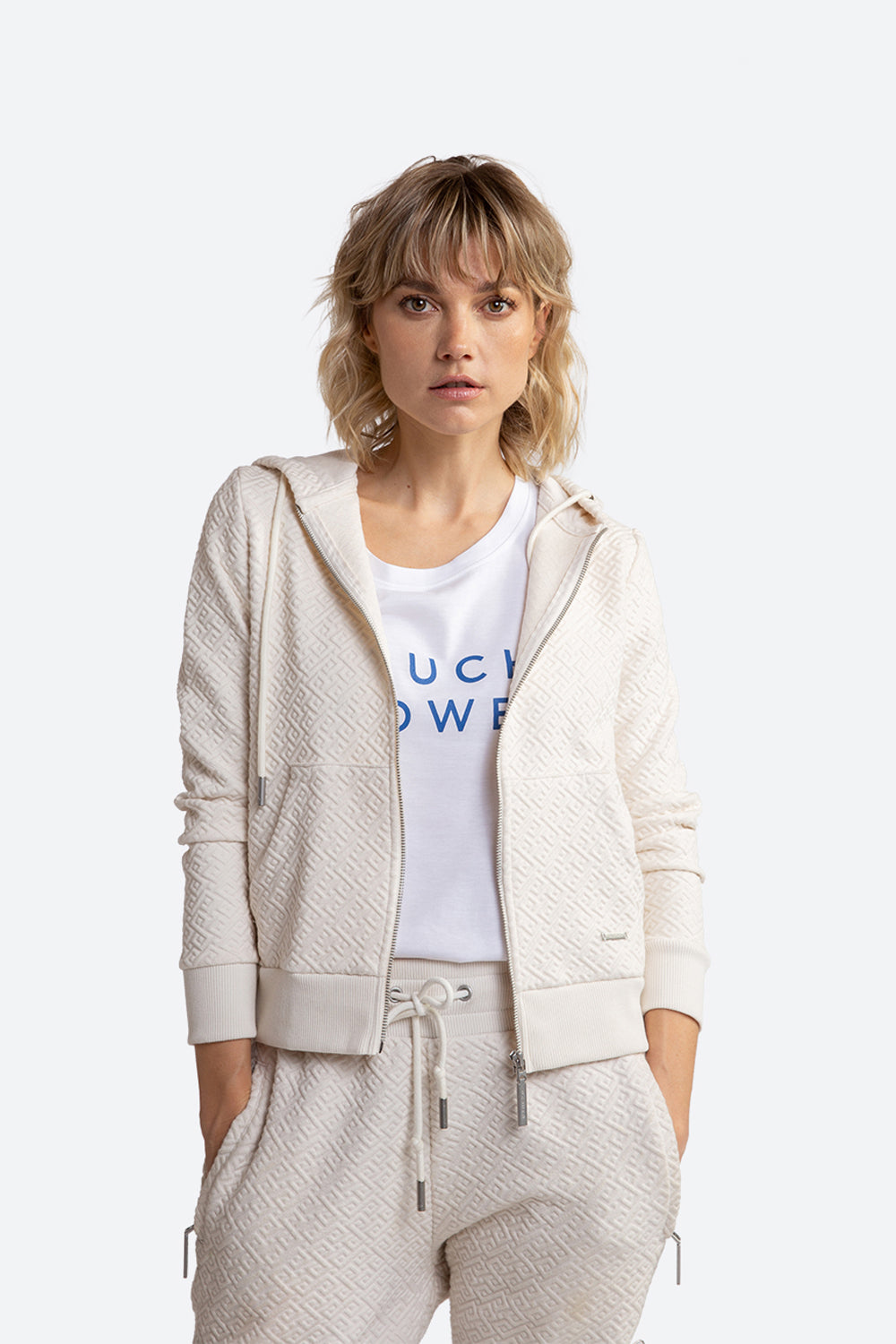 Women wearing Alsina Gaucho Pattern Zip Hoodie in Cream