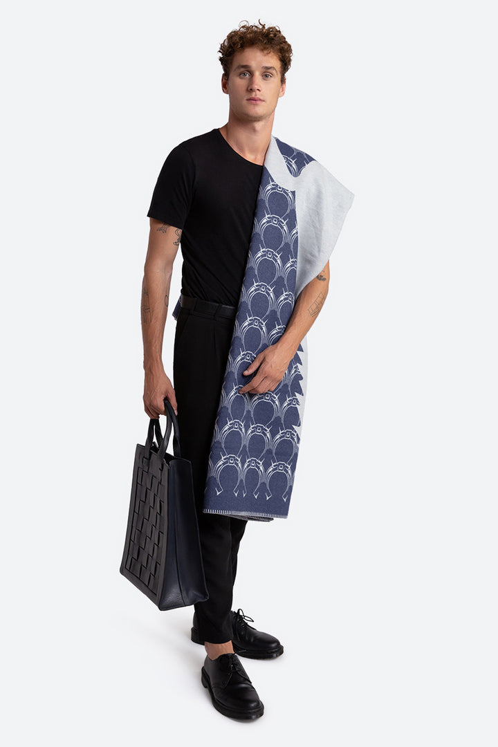 Man holding the Esquel bag in navy.