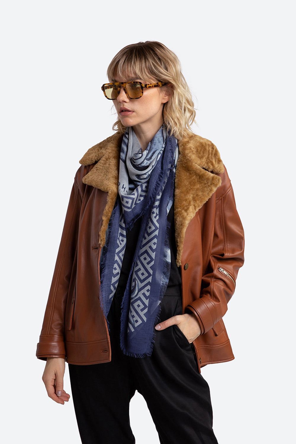 Woman models the Lavalle Shearling Collar Jacket in Cognac