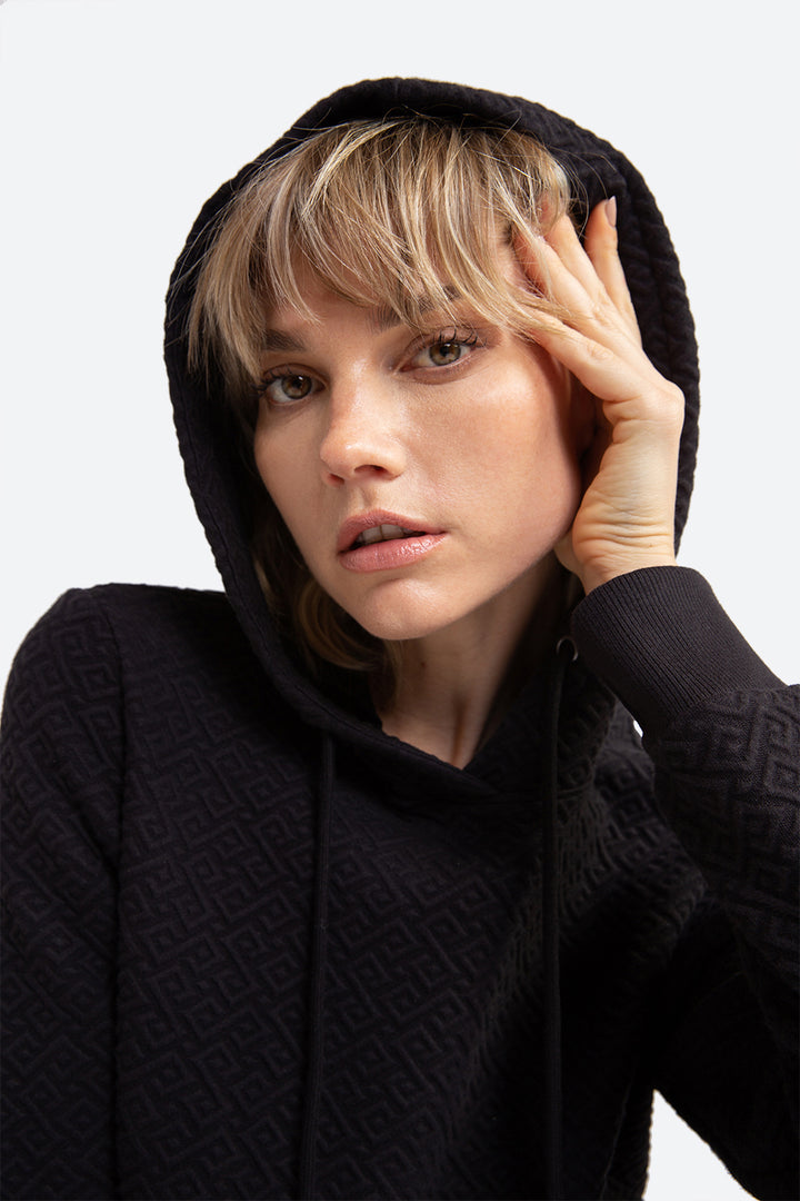 Woman wearing a Gorriti Gaucho Pattern Hoodie